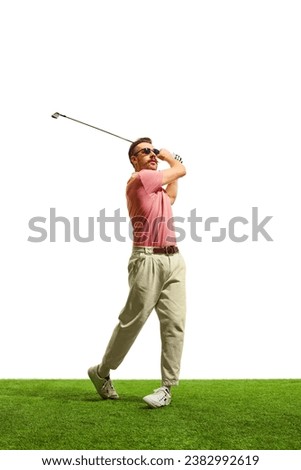 On vibrant, emerald fairway, golfer's flawless form and meticulous technique radiate expertise, painting picture of grace and control. Concept of game, sport, recreation, active lifestyle. Copy space.