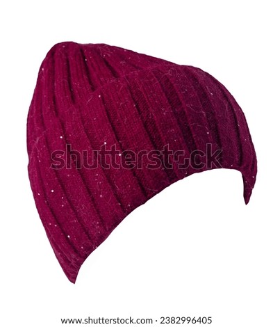 women's knitted burgundy hat isolated on white background. warm winter accessory Royalty-Free Stock Photo #2382996405
