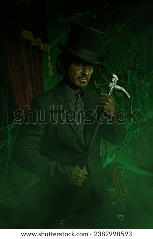 Portrait of a scary mysterious man with huge scars on his face and neck, dressed in an elegant black suit and top-hat, standing in an old castle covered with cobwebs. Gothic horror novel. Halloween. Royalty-Free Stock Photo #2382998593