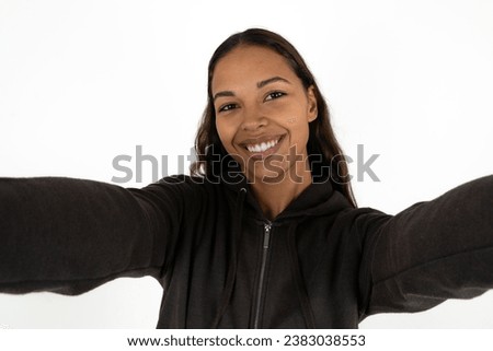 Photo of beautiful dark haired woman do selfie