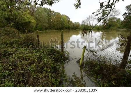 Flooded public footpath and farmland in Horley, Surrey on November 2nd 2023 after Storm Ciaran. 