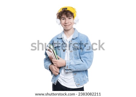 PNG of teenage boy in headphones with books isolated on white background.