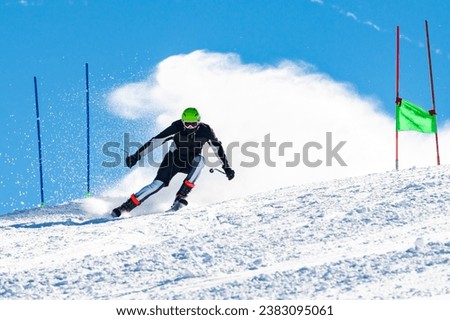 Skier on a slope in the italian alps Royalty-Free Stock Photo #2383095061