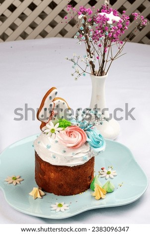 Easter cake with decorative elements, figurines and toppings.