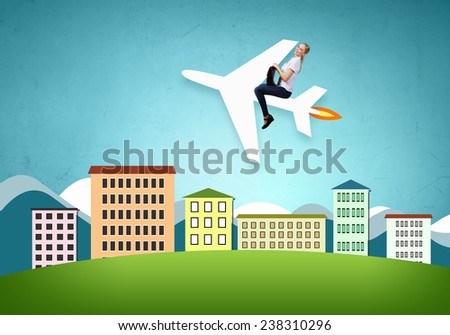 Young woman riding drawn airplane flying in air