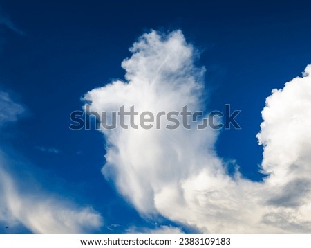 Beautiful blue sky background, white clouds, twilight sunset and colorful clouds - sunlight with dramatic cloud covering thinly spread the sky