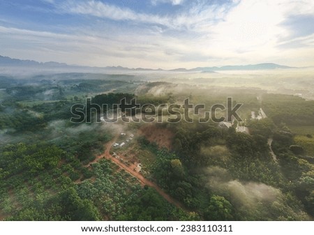 Drone Aerial Landscape Photography Above the mist-shrouded mountains colorful nature background