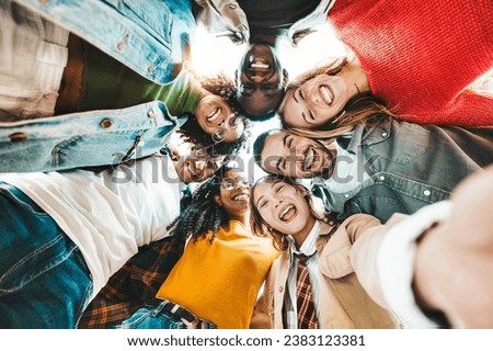 International group of young people smiling together at camera - Happy friends taking selfie pic with smart mobile phone outdoors - Youth community and technology life style concept