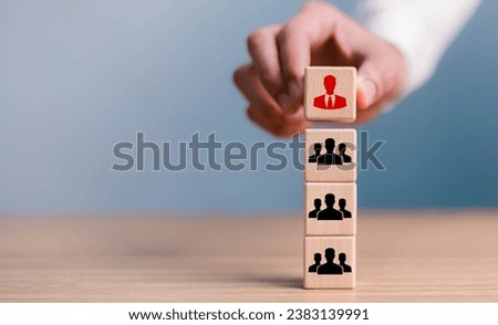 Organization and team structure symbolized with cubes, leadership manager team of company, business organizational hierarchy job concept, president job change control Royalty-Free Stock Photo #2383139991