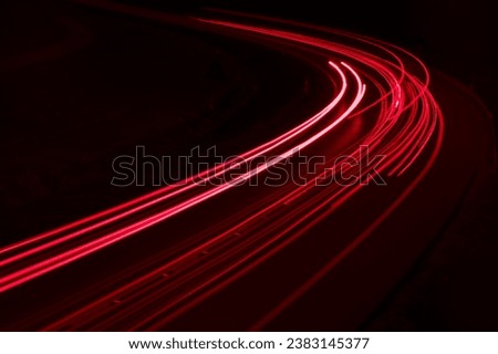 lights of cars driving at night. long exposure Royalty-Free Stock Photo #2383145377