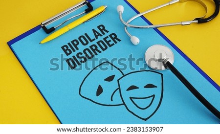 Bipolar disorder is shown using a text and picture of happy and sad masks