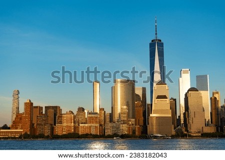 skyscraper cityscape of metropolitan city of new york, manhattan. manhattan cityscape with skyscraper architecture. manhattan with ny city skyline. cityscape of nyc manhattan during sunrise Royalty-Free Stock Photo #2383182043