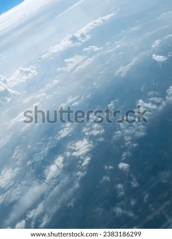 Clouds on the bright air, aerial shot in plane