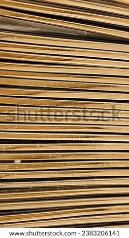 Stack of cardboard in the warehouse. Close-up. Selective focus.