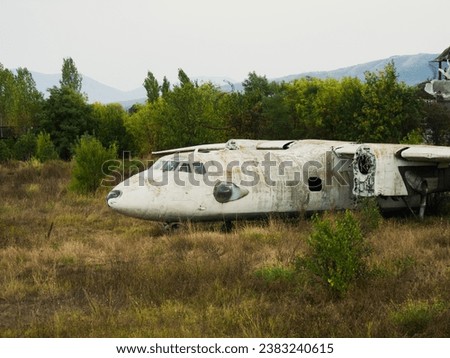 Abandoned plane, old crashed plane Royalty-Free Stock Photo #2383240615