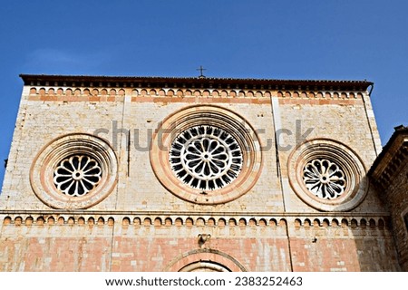 Architectural details of the external facade of the Abbey of San Pietro in Assisi, Umbria, Italy Royalty-Free Stock Photo #2383252463