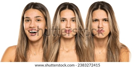 Collage of same beautiful young women with three different emotions on a white studio background.