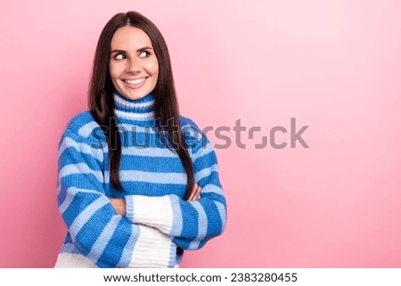 Photo of positive pretty lady beaming smile crossed arms look interested empty space isolated on pink color background