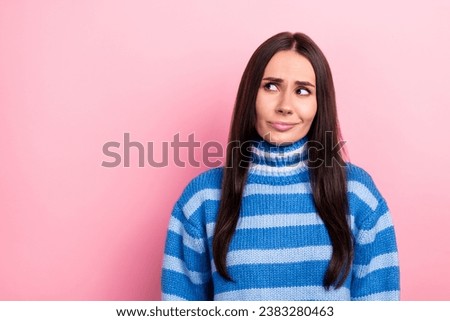Portrait of nice minded young lady look interested empty space hesitate contemplate isolated on pink color background