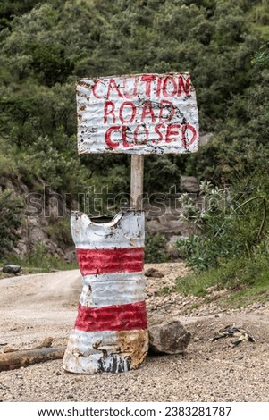 Sign caution road closed in the Hell's Gate National Park, Kenya