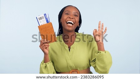 Black woman, passport and ok sign for studio portrait with airplane ticket, documents and excited by blue background. Girl, paperwork and emoji for compliance, immigration and international travel