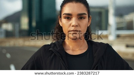 Training, city portrait or woman with serious mindset for outdoor cardio, wellness workout or morning sports run. Sweaty face, street road or active athlete, runner or jogger for exercise performance Royalty-Free Stock Photo #2383287217