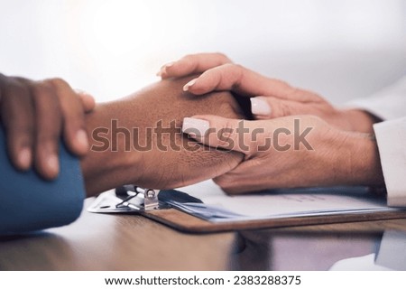 Cancer, support and doctor holding hands of patient for care, kindness and hope. Comfort, medical professional and person consulting for wellness, healthcare and empathy, help and therapy in hospital