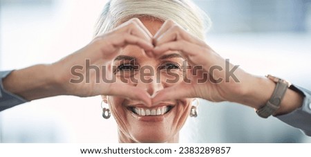 Portrait, hands and heart with a business woman in the office, feeling love for her corporate career. Face, emoji or hand sign with a senior female manager or ceo work looking happy and confident