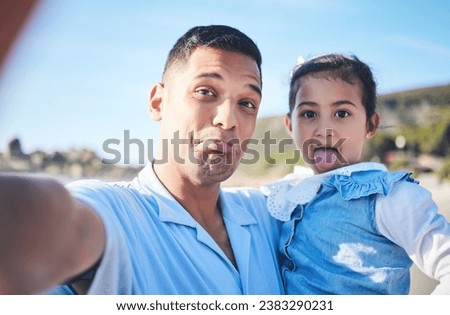 Father, daughter and funny face in beach selfie, portrait or memory together in summer, vacation or outdoor. Man, young girl kid and comic for photography, profile picture or holiday on social media