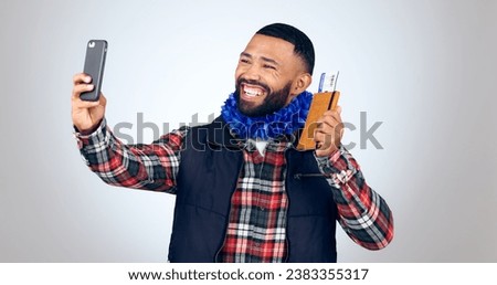 Selfie, travel and passport with a man tourist in studio on a gray background for vacation memories. Smile, id or boarding pass with a happy young person taking a profile picture on a holiday trip