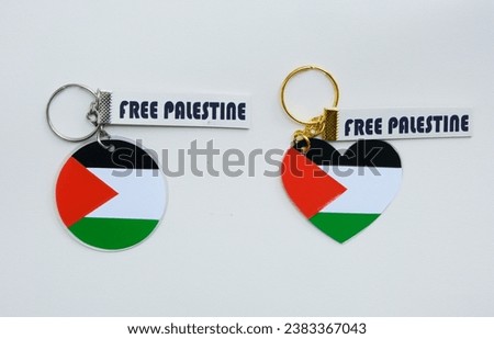 A picture of Palestine Flag keycahin with Free Palestine word.