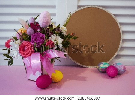  Happy easter! Flat Lay, postcard or Internet banner with Copy Space on Easter.  Bouquet of flowers and Easter eggs                              