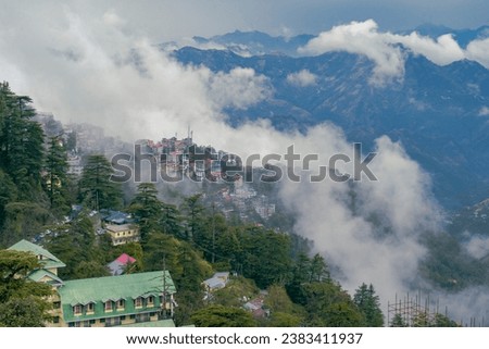 Beautiful Shimla - Clouds Kissing the Shimla town in a beautiful afternoon. Royalty-Free Stock Photo #2383411937
