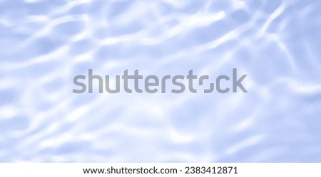 Natural background of water in summer. Blue surface. Clear water with ripples and splashes. water waves in sunlight The water surface has waves.