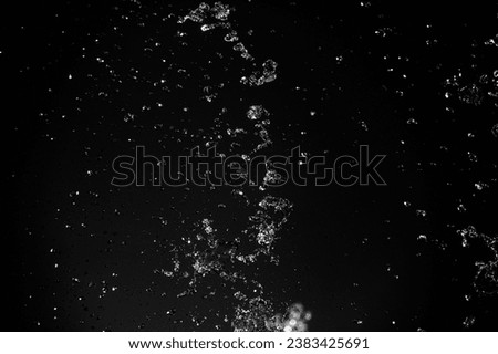 waterdrops bubbles on a dark background Royalty-Free Stock Photo #2383425691