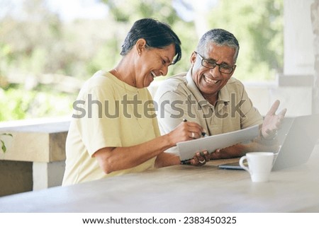 Laptop, budget and senior couple planning retirement pension fund online, internet or working together. Happy, paperwork and elderly people writing an mortgage plan or sign a contract in a home