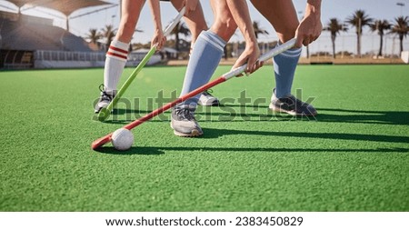 Sport, hockey and athlete legs on field playing game and fitness people workout, competition and exercise outdoor. Sports match, hockey player competitive and active life with training at stadium. Royalty-Free Stock Photo #2383450829
