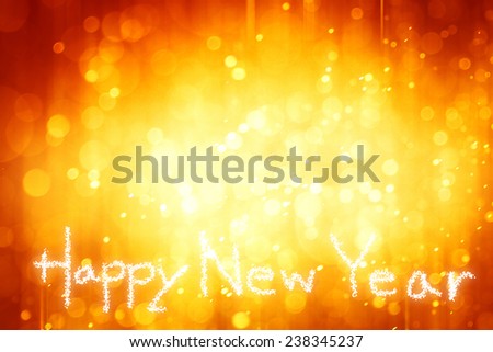 happy new year  in bokeh and lens flare pattern on summer orange background 