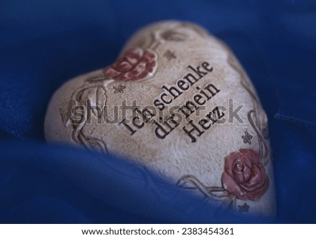 I give you my heart, stone heart in blue tulle with love message, heart, love, heartbreak, concept, wedding, marriage proposal, love confession, love symbol, heartbreak