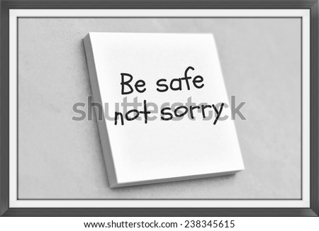Vintage style text be safe not sorry on the short note texture background