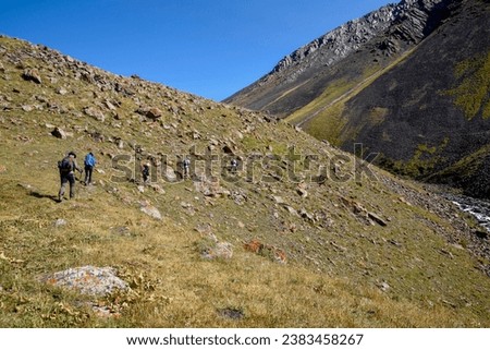 Hikers in the West Karakol Valley, Tien Shan Mountains, Naryn region, Kyrgyzstan