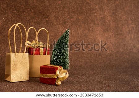 Christmas gifts, paper bags and Christmas tree. Discounts for Christmas, shopping for the holidays