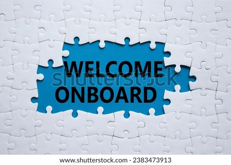 Welcome onboard symbol. Concept words Welcome onboard on white puzzle. Beautiful blue background. Business and Welcome onboard concept. Copy space.