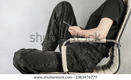 How to sit correctly, bad and good posture. The girl is sitting on a chair. Posture concept. Royalty-Free Stock Photo #2383476779