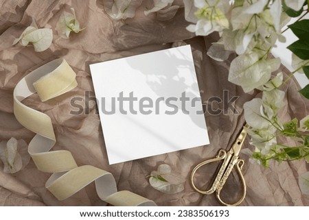 Square card mockup on beige background  Royalty-Free Stock Photo #2383506193