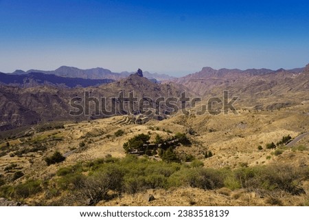 
View of the peaks of Gran Canaria in early autumn. In the background the Roque Bentayga Royalty-Free Stock Photo #2383518139