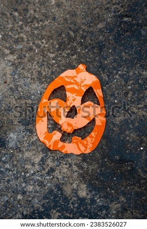 Pumpkin decoration for halloween on the ground.