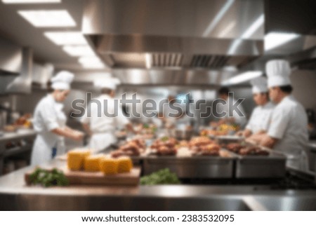 Blurred background of a professional kitchen of a restaurant or hotel with chefs and cooks
