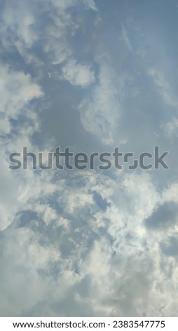 sky and many clouds. pale sky. Background with clouds on blue sky.