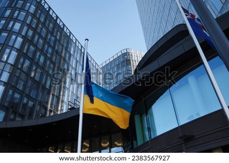 a photo of the Ukrainian flag together with the flag of the European Union (support Ukraine in Europe)